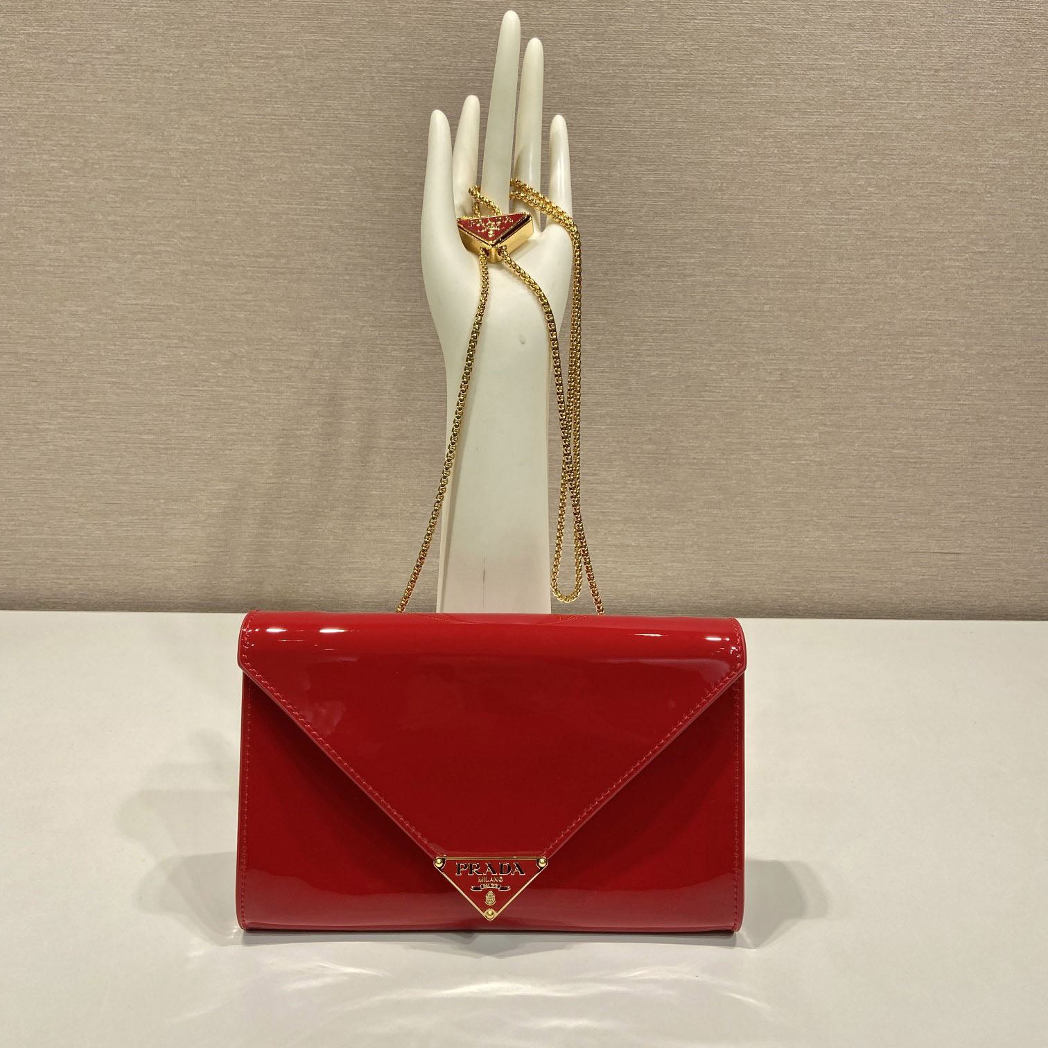 Pra*a clutch bags